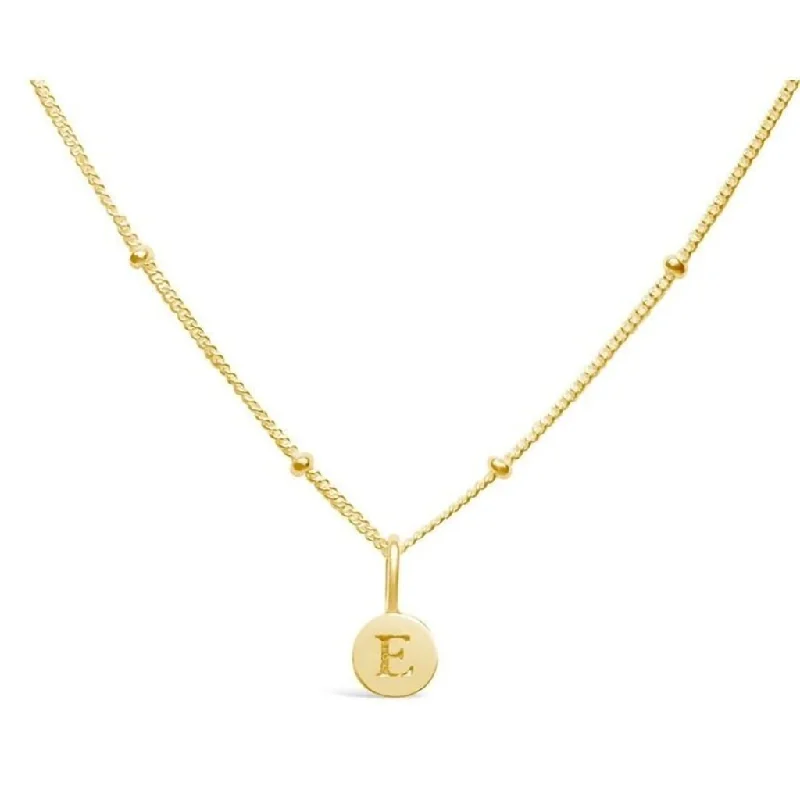 Stia : Love Letter "E" Mini Disk Necklace in Gold