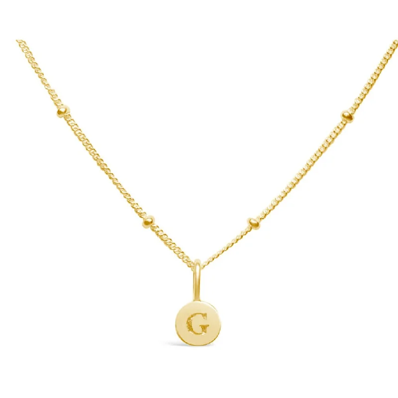 Stia : Love Letter "G" Mini Disk Necklace in Gold