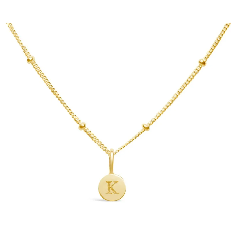 Stia : Love Letter "K" Mini Disk Necklace in Gold